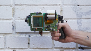Guy invents an 8-Bit instant camera gun that prints images on receipts